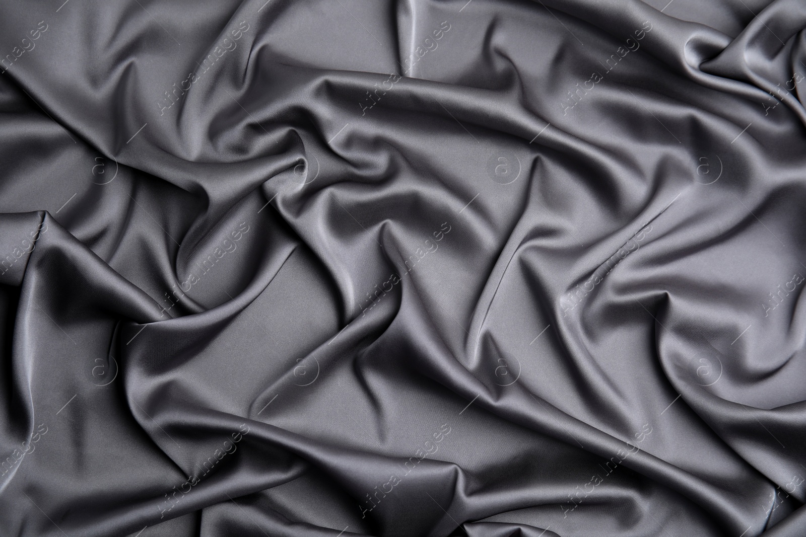 Photo of Texture of delicate black silk as background, top view