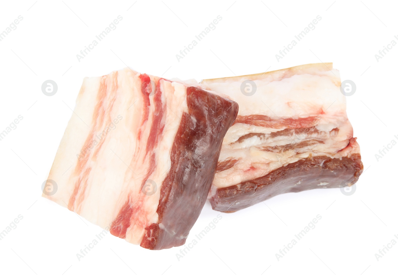 Photo of Pieces of tasty bacon isolated on white