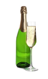 Photo of Bottle and glass with champagne on white background. Festive drink