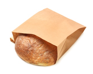 Photo of Paper bag with bread on white background. Space for design