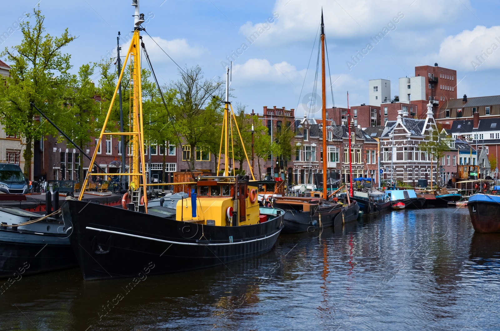 Photo of Beautiful view of city canal with moored boats