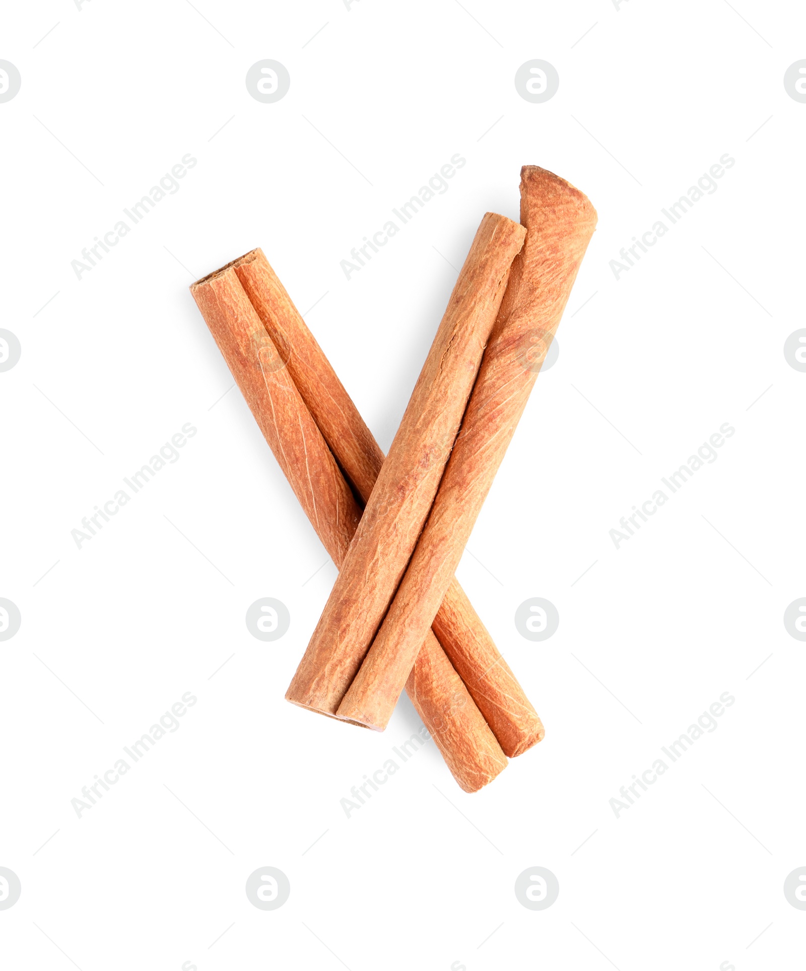 Photo of Cinnamon sticks isolated on white, top view