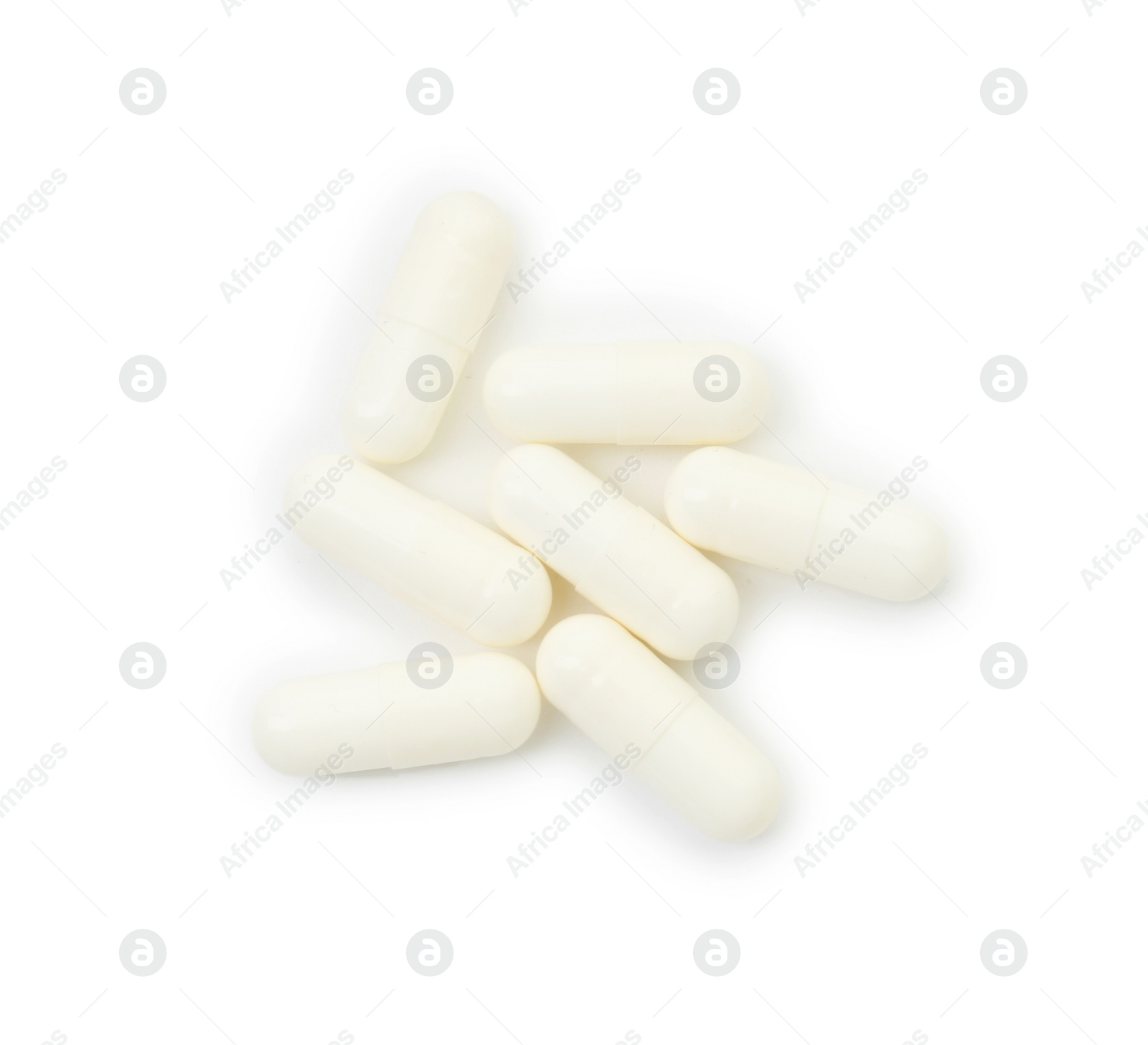 Photo of Vitamin capsules isolated on white, top view. Health supplement