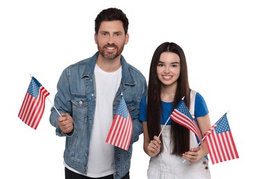 Image of 4th of July - Independence day of America. Happy father and his daughter with national flags of United States on white background
