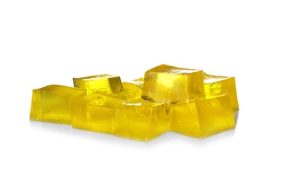 Photo of Pile of tasty jelly cubes isolated on white