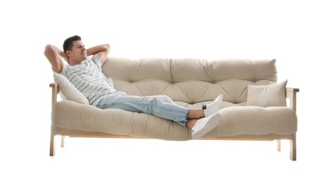 Photo of Man relaxing on comfortable sofa against white background