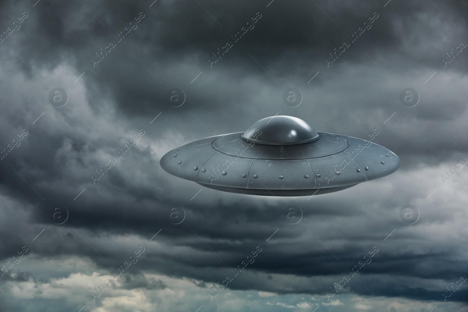 Image of UFO. Alien spaceship among clouds in sky. Extraterrestrial visitors