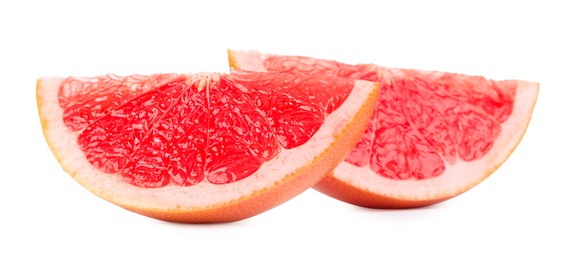 Photo of Cut ripe grapefruit isolated on white. Citrus fruit