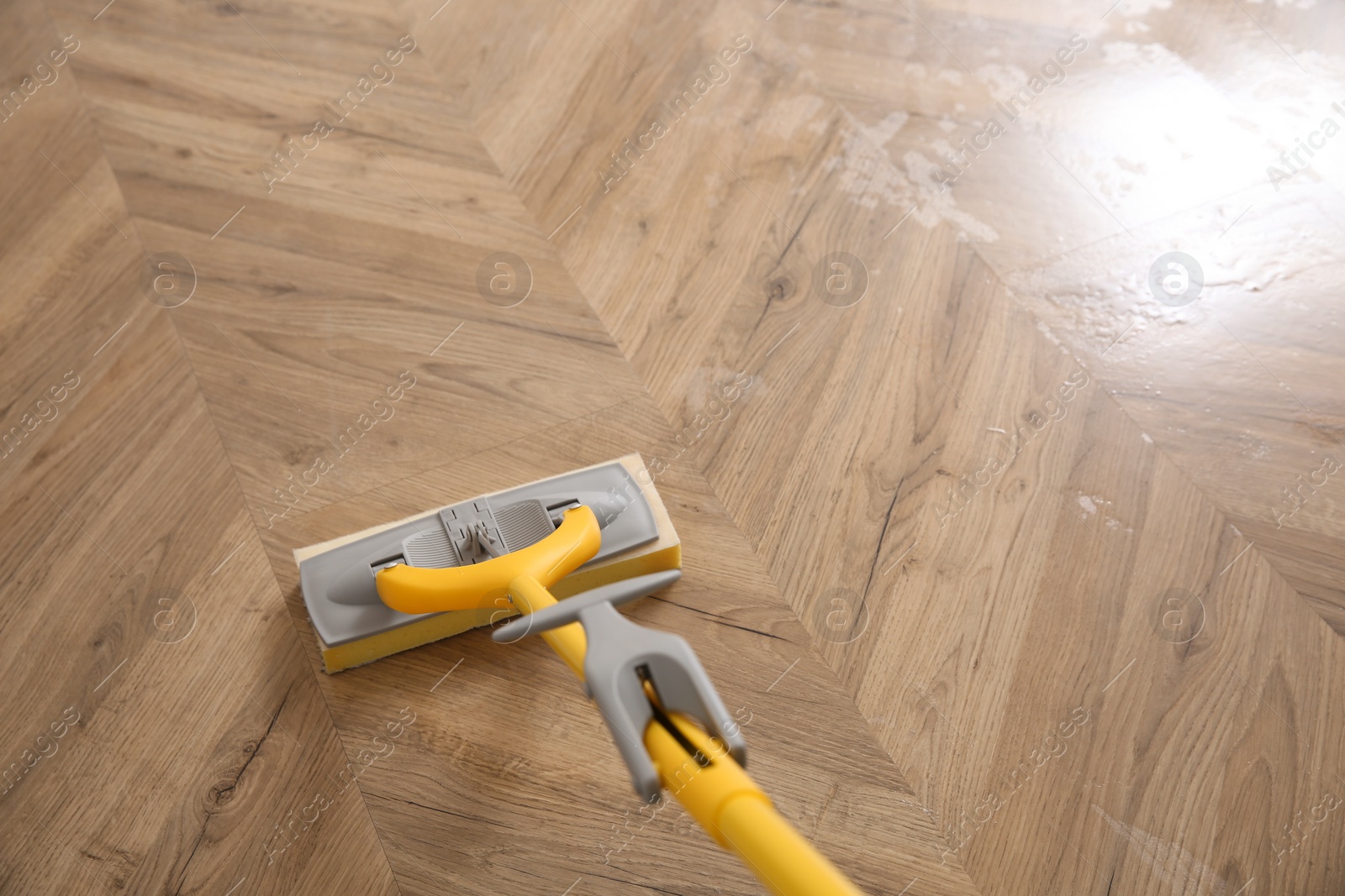 Photo of Washing of parquet floor with mop, above view. Space for text