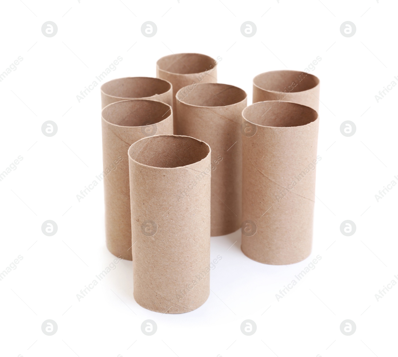 Photo of Empty paper toilet rolls on white background