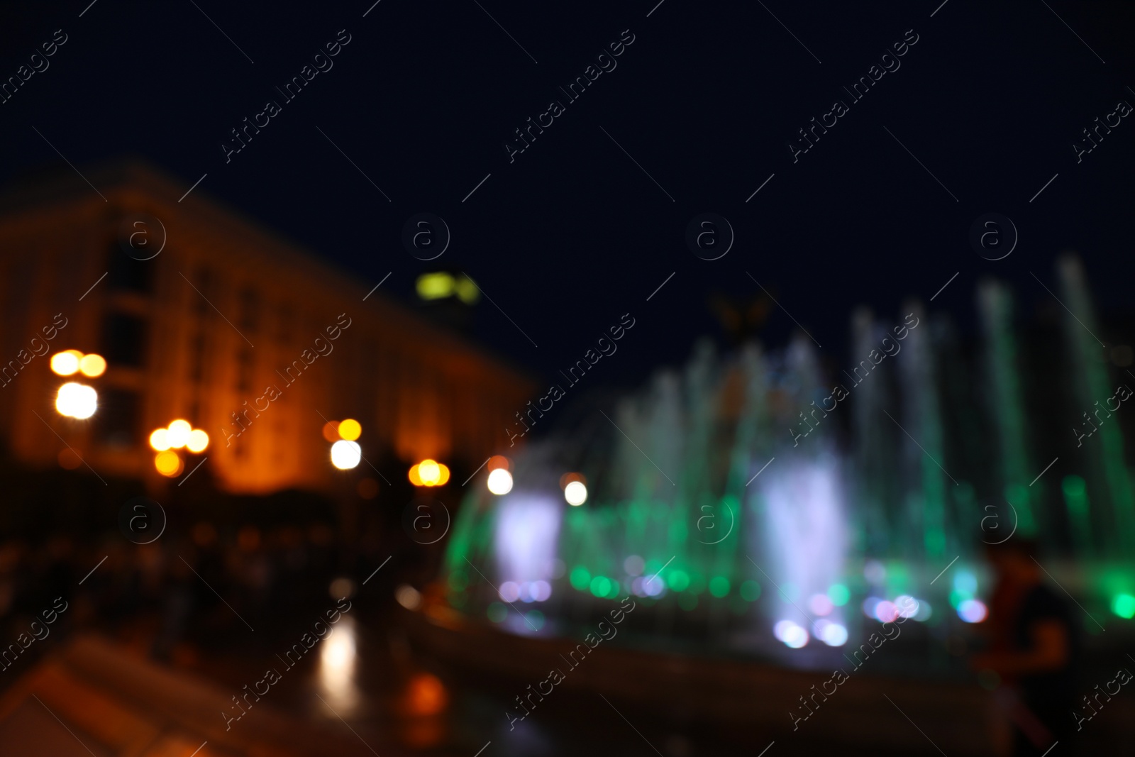 Photo of Blurred view of beautiful city at night. Bokeh effect