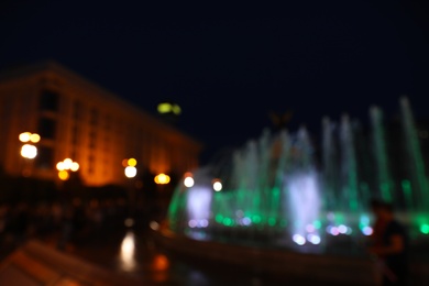 Photo of Blurred view of beautiful city at night. Bokeh effect