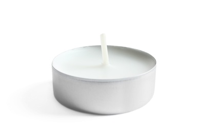 Photo of New small wax candle on white background