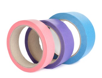 Many different rolls of adhesive tape on white background