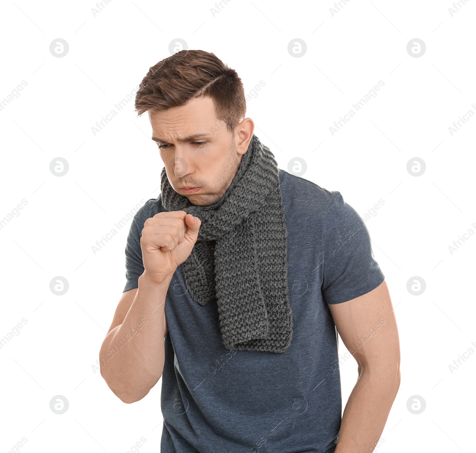 Photo of Young man coughing on white background