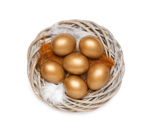 Golden eggs in nest on white background, top view