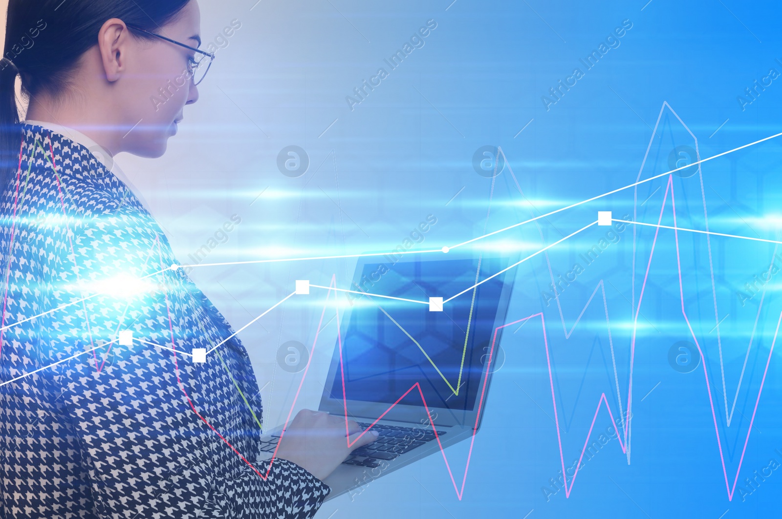 Image of Businesswoman with laptop and on light blue background. Forex trading