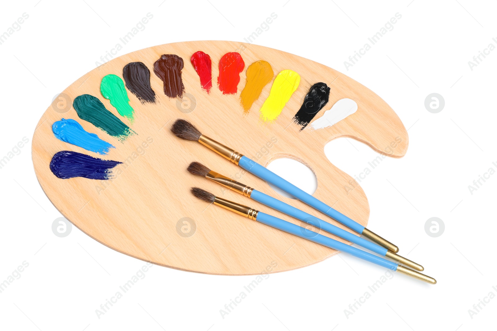 Photo of Palette with paints and brushes on white background, top view. Artist equipment