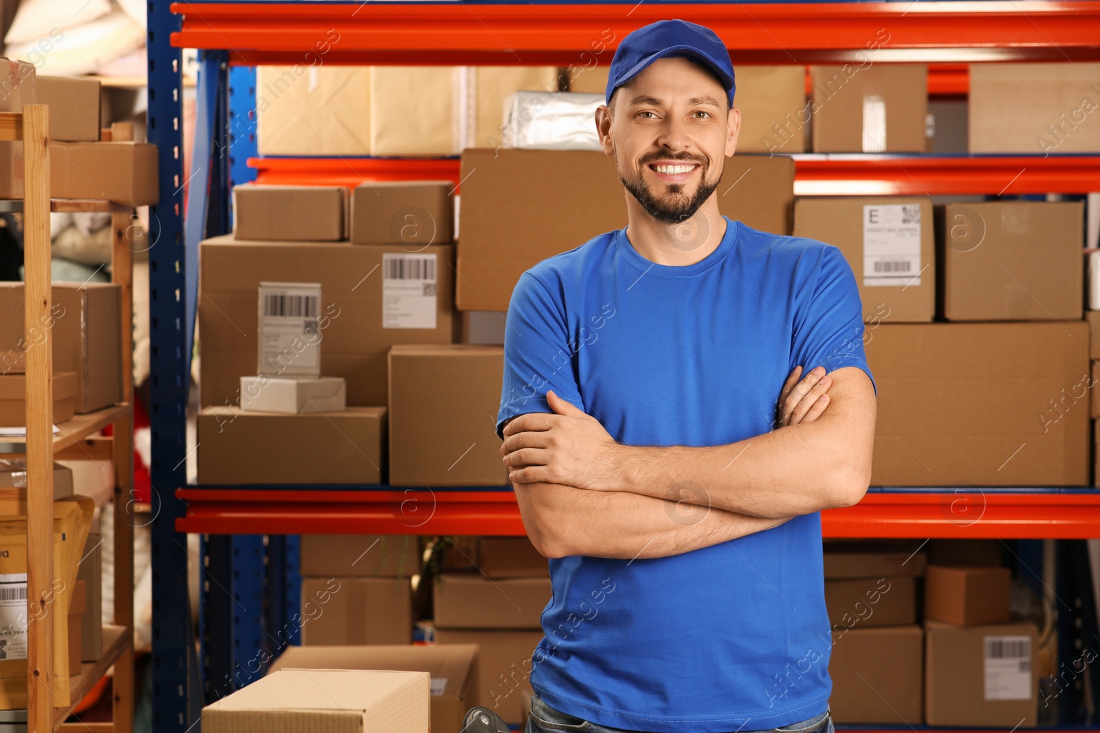 Photo of Post office worker near rack with parcels indoors, space for text