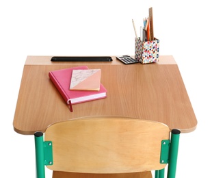 Wooden school desk with stationery on white background