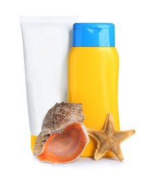 Different suntan products, starfish and seashell on white background
