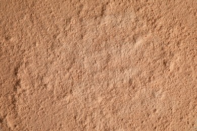 Photo of Loose face powder as background, top view
