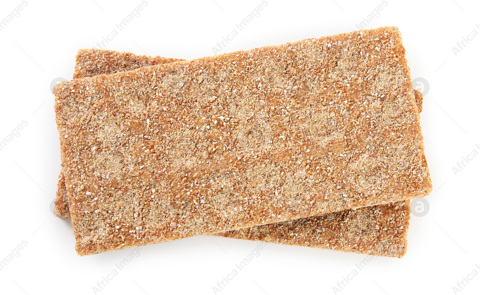 Photo of Fresh crunchy rye crispbreads on white background, top view
