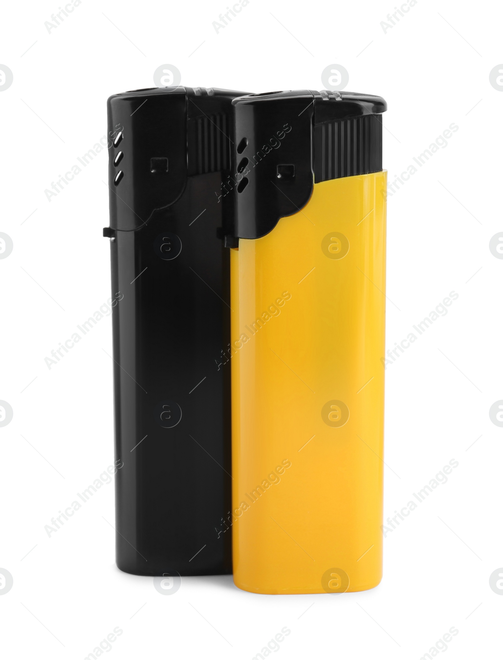 Photo of Stylish small pocket lighters on white background