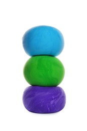 Stack of color play dough balls isolated on white