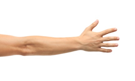 Photo of Young man held out hand on white background, closeup