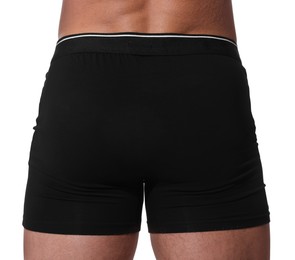 Young man is stylish black underwear on white background, closeup