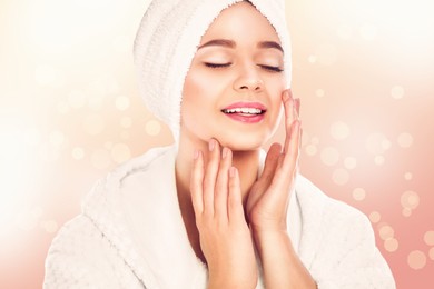 Image of Beautiful young woman with silky skin on light background. Spa treatment 