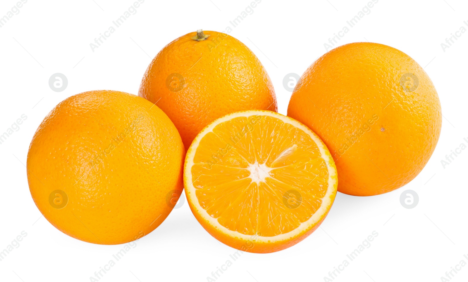 Photo of Whole and cut ripe oranges isolated on white