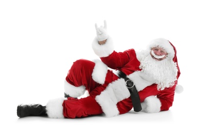 Photo of Authentic Santa Claus lying on white background