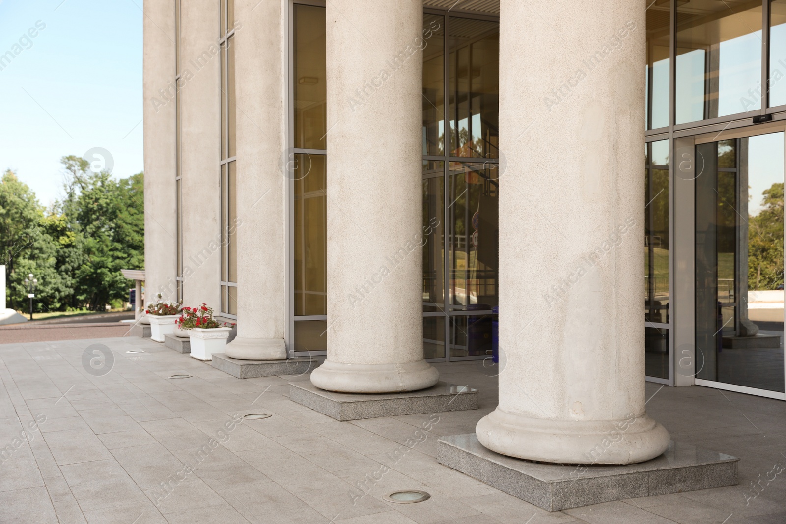 Photo of Supreme court building with pillars. Law and justice