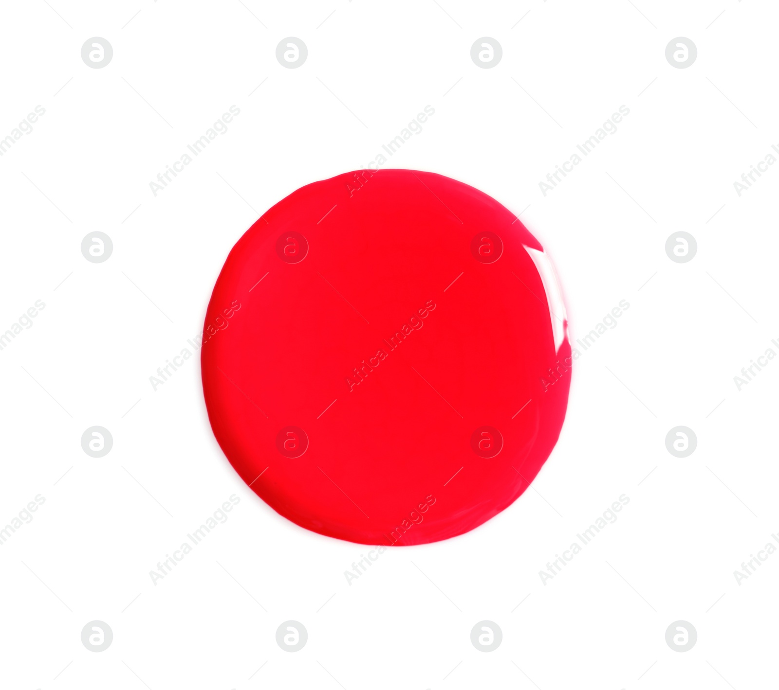 Photo of Spilled bright nail polish on white background, top view