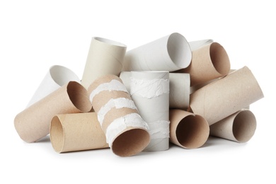 Empty toilet paper rolls on white background