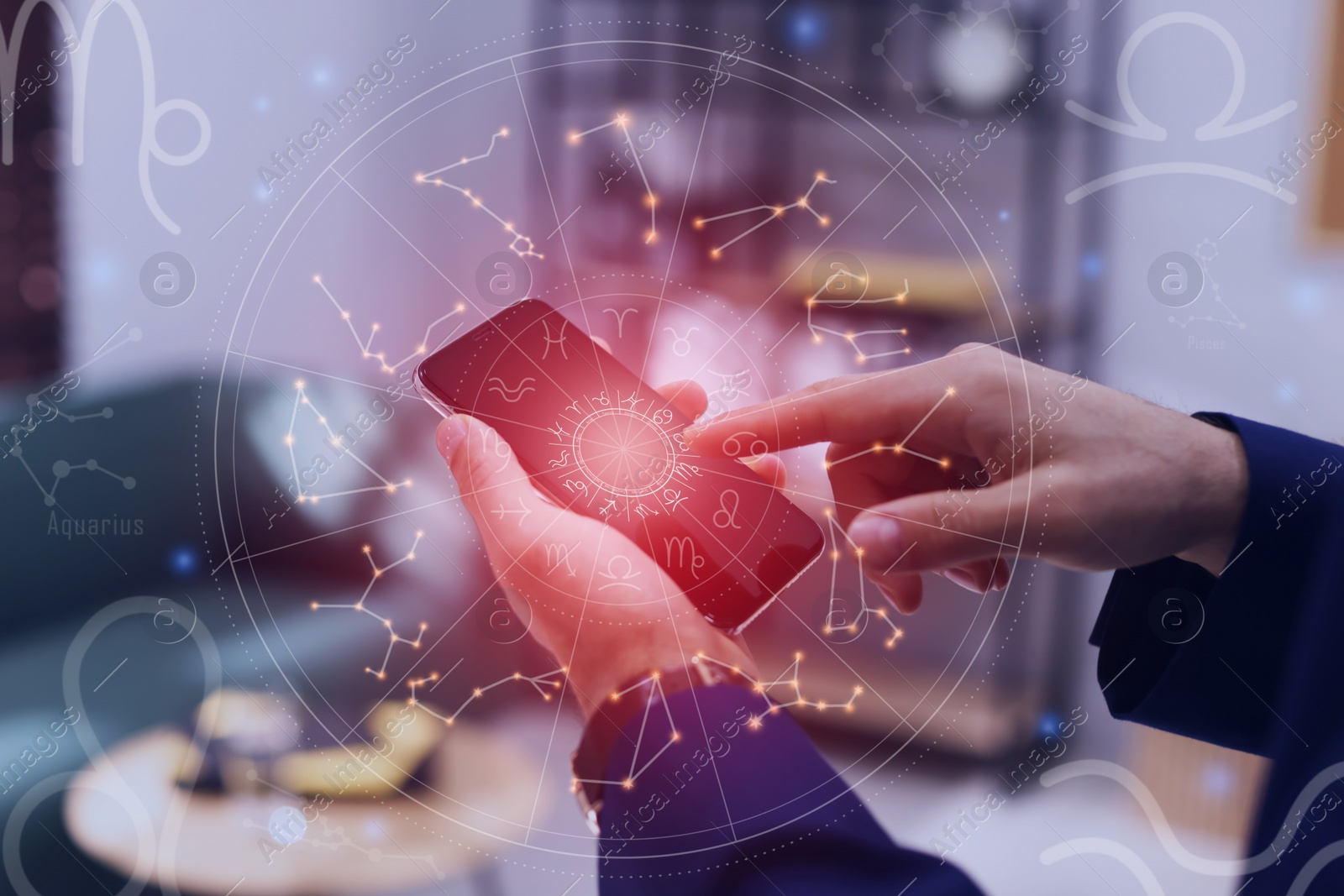 Image of Man with smartphone reading daily horoscope indoors, closeup