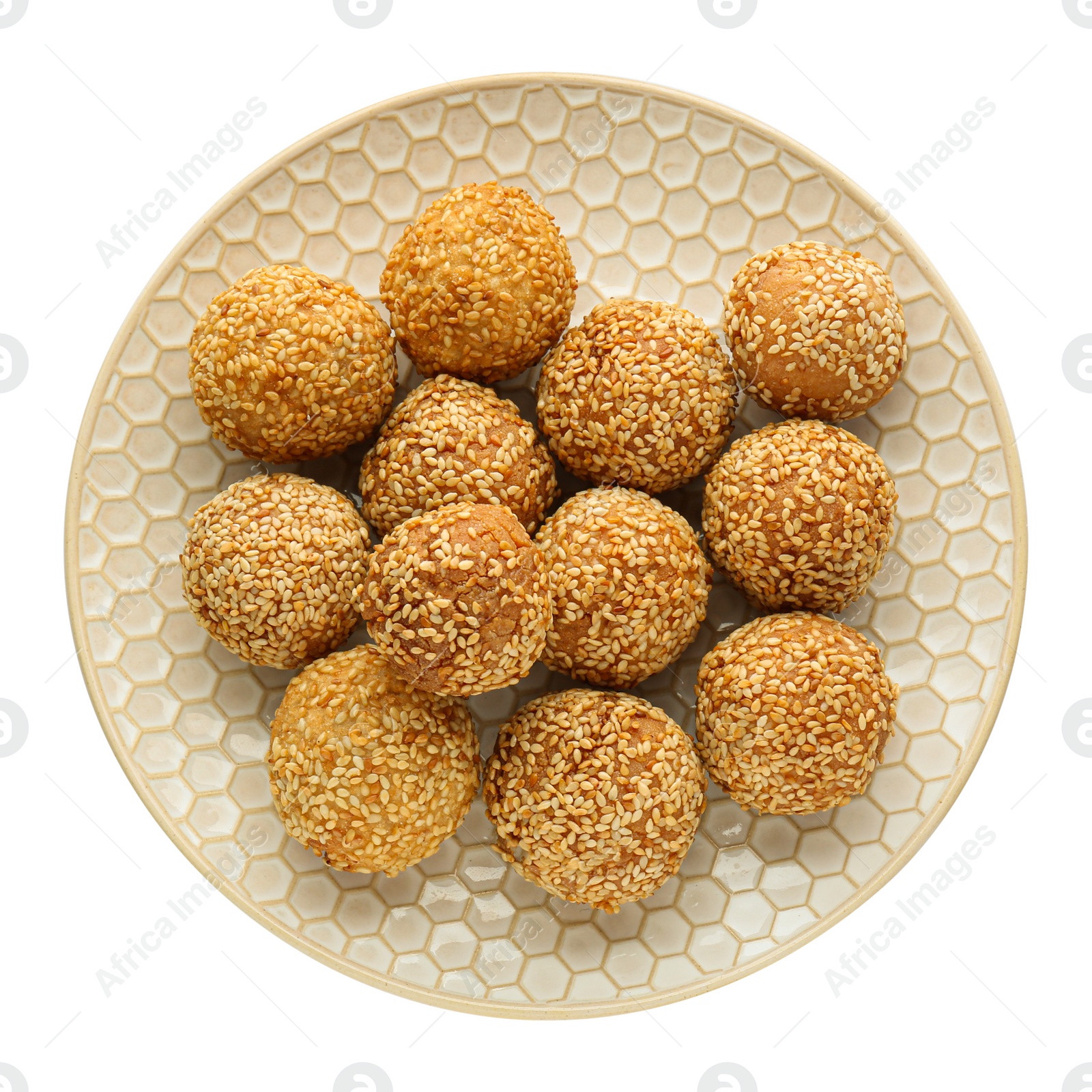 Photo of Plate of delicious sesame balls on white background, top view