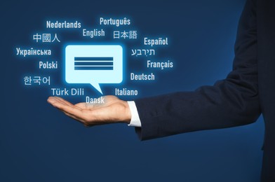 Image of Translator and names of different languages on dark blue background, closeup