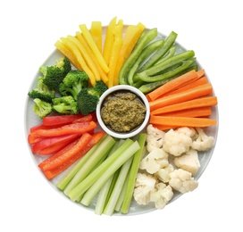 Plate with celery sticks, other vegetables and dip sauce isolated on white, top view