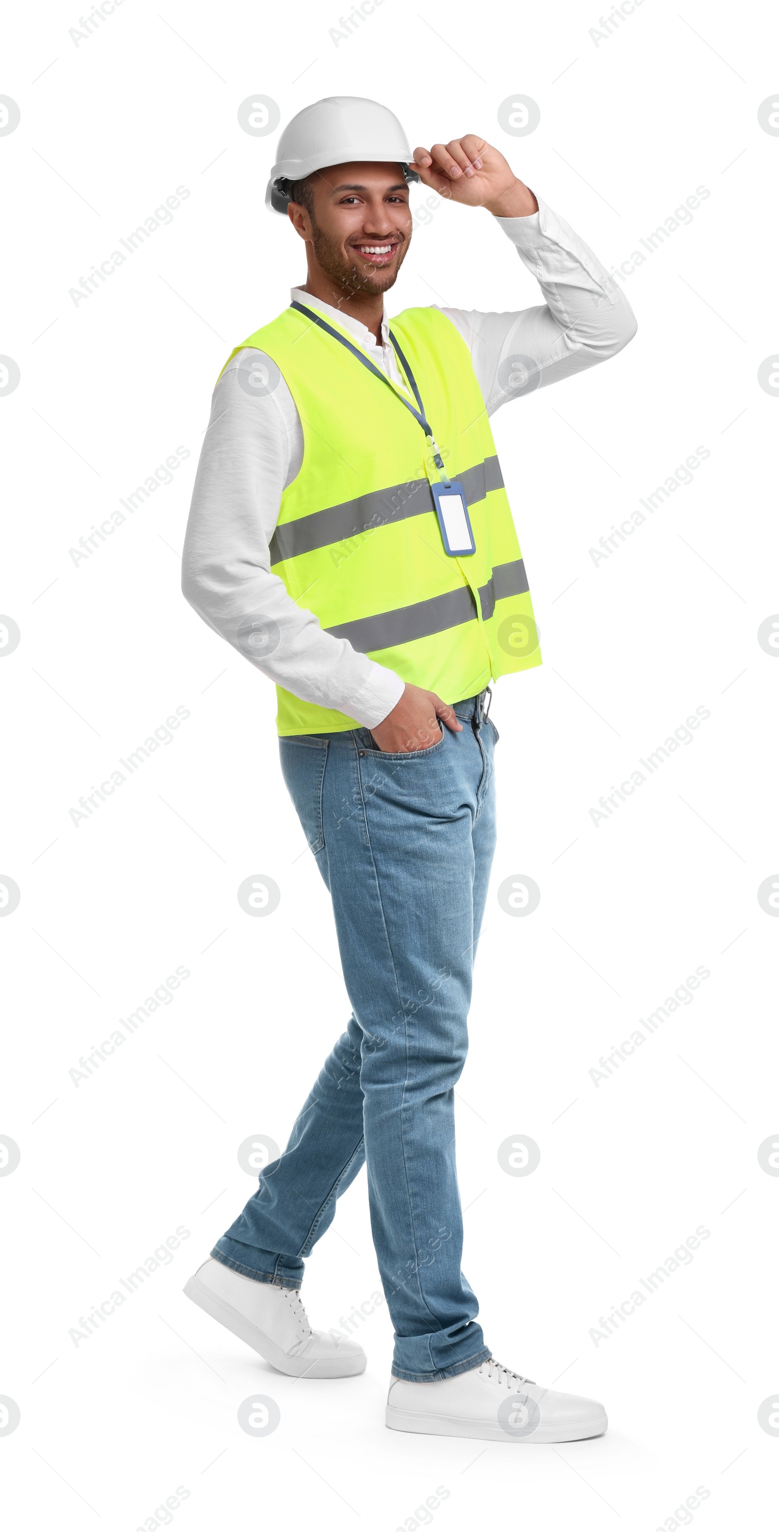 Photo of Engineer with hard hat and badge on white background