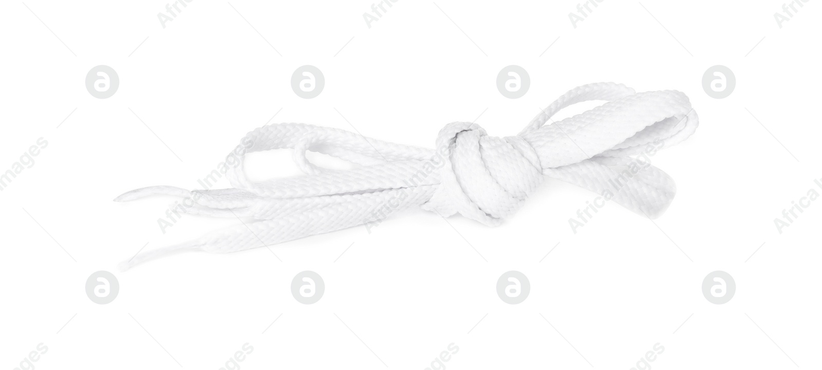 Photo of New shoe lace tied in knot isolated on white