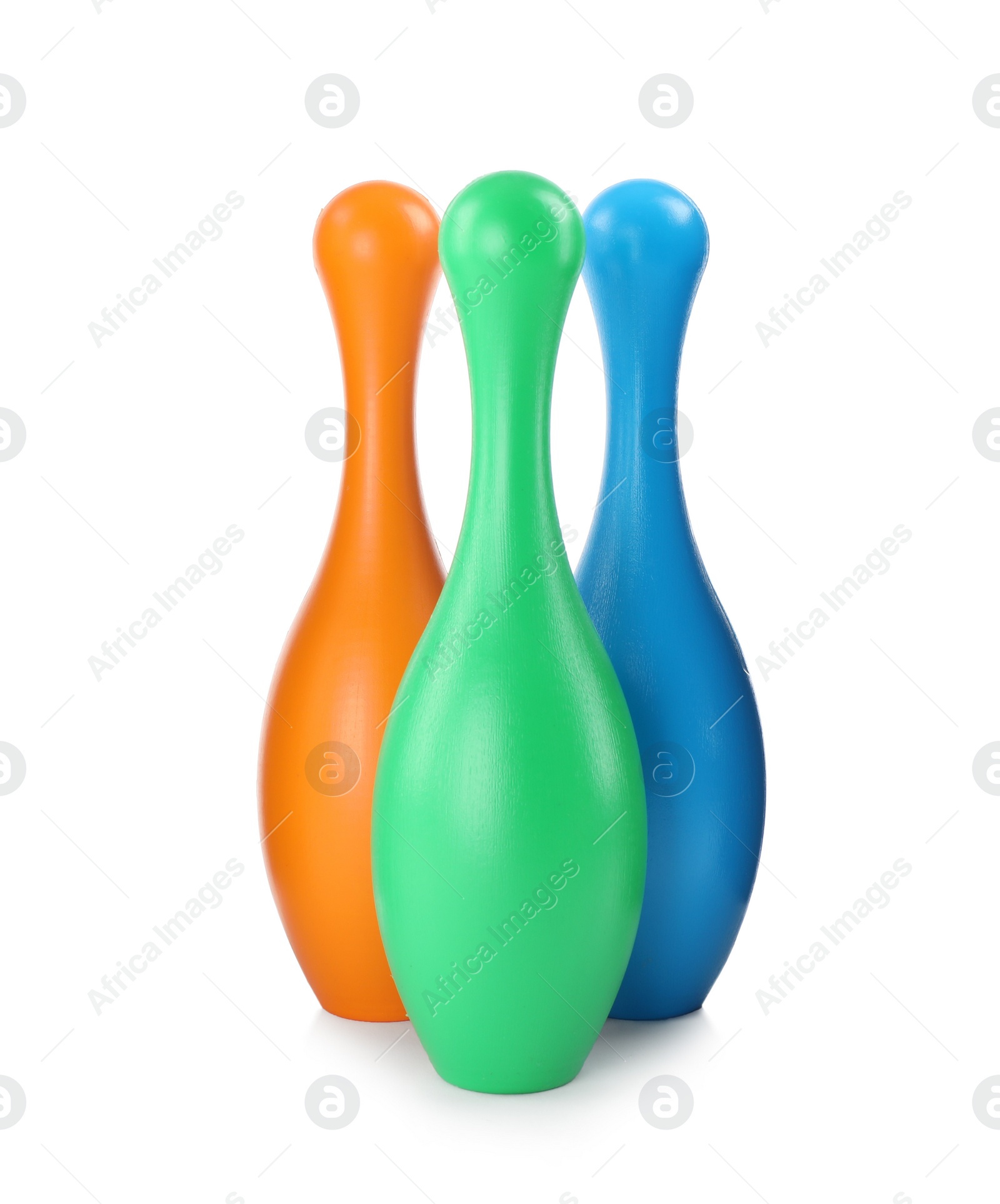 Photo of Colorful bowling pins isolated on white. Child toy