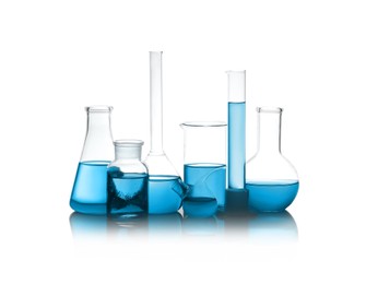 Image of Laboratory glassware with blue liquid isolated on white