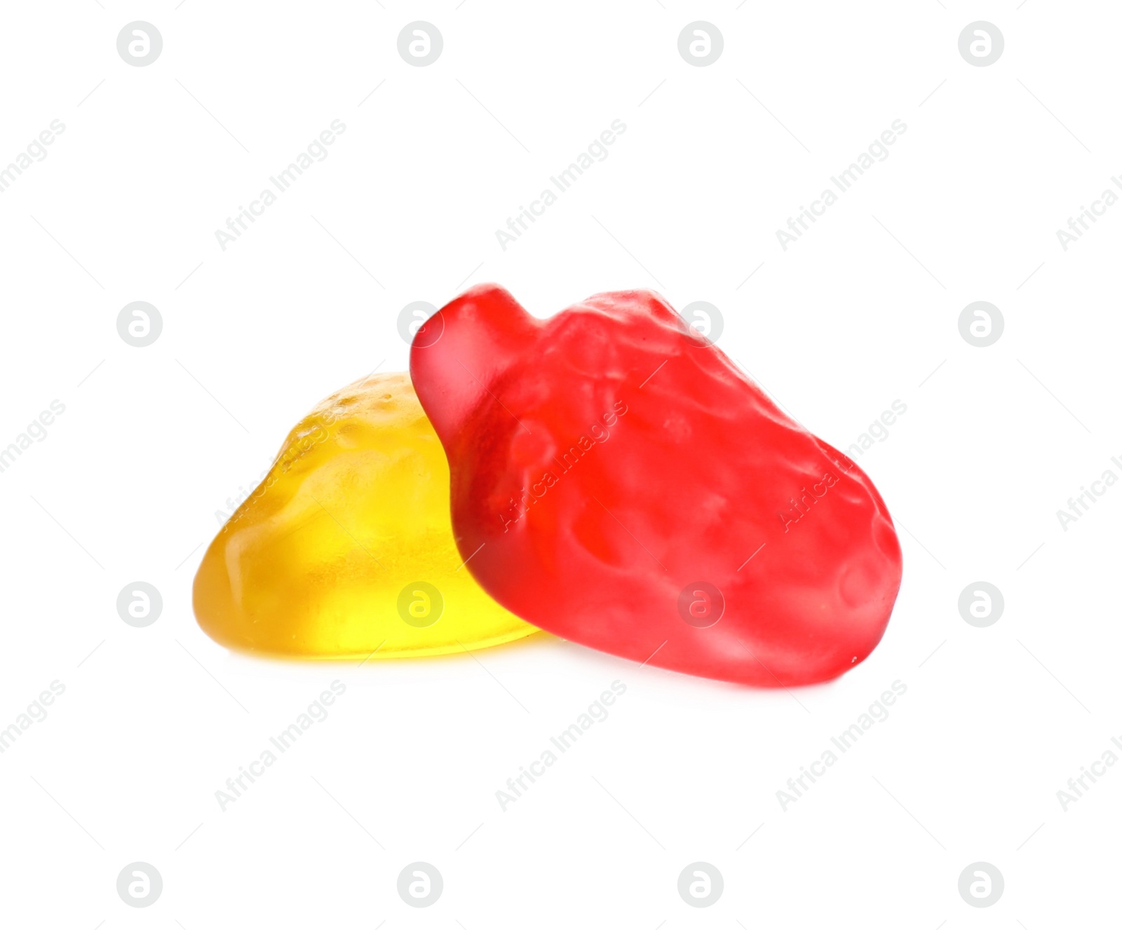 Photo of Tasty jelly fruit shaped candies on white background