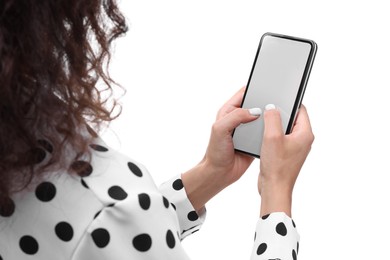 Woman typing message on smartphone against white background, closeup
