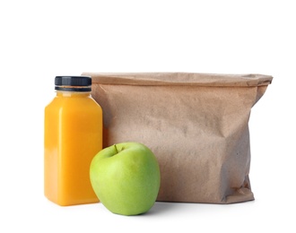 Healthy food and paper bag on white background. School lunch