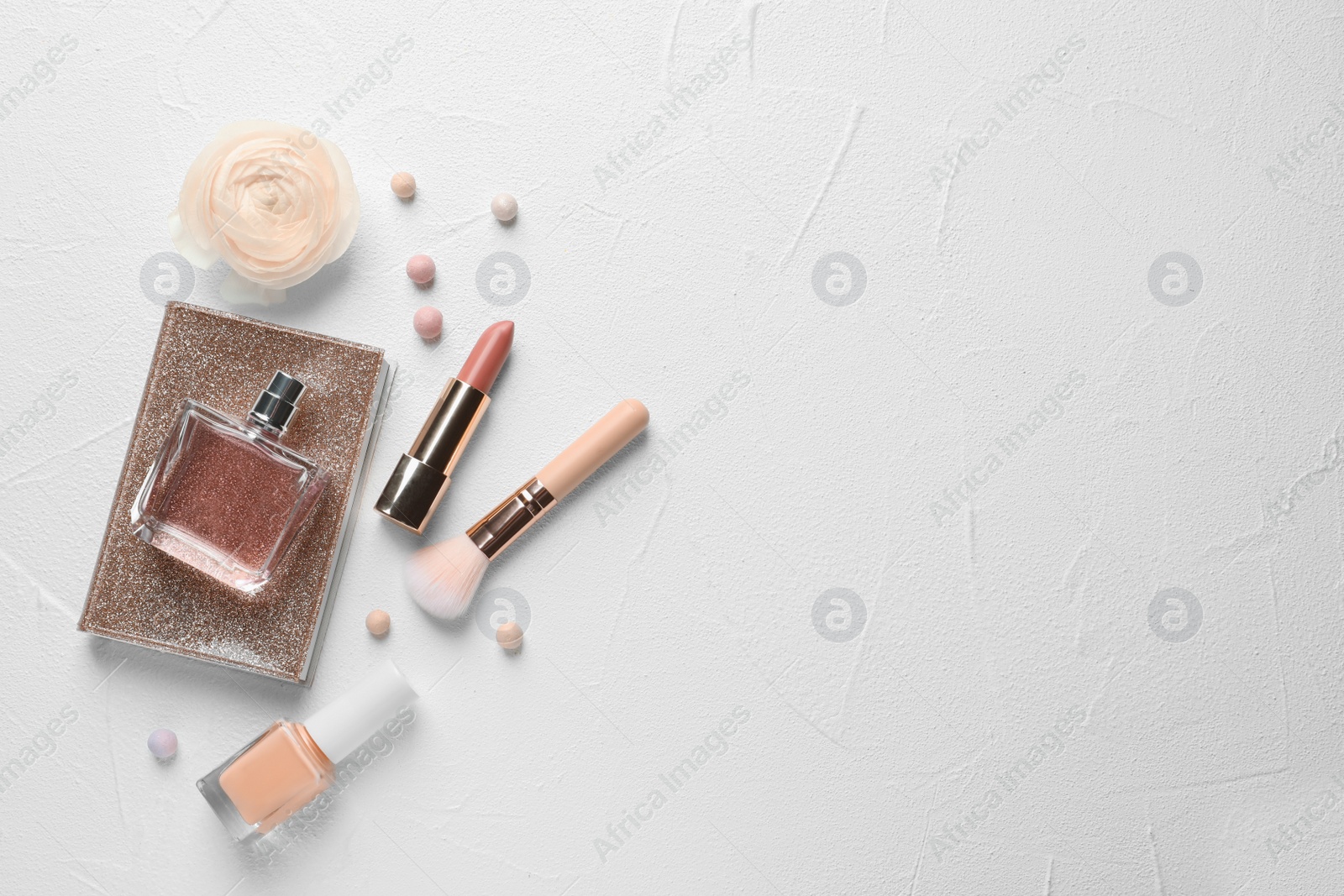 Photo of Flat lay composition with decorative cosmetics on light background