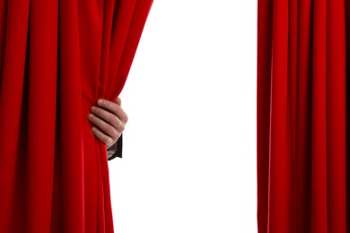 Photo of Man opening red front curtains on white background, closeup